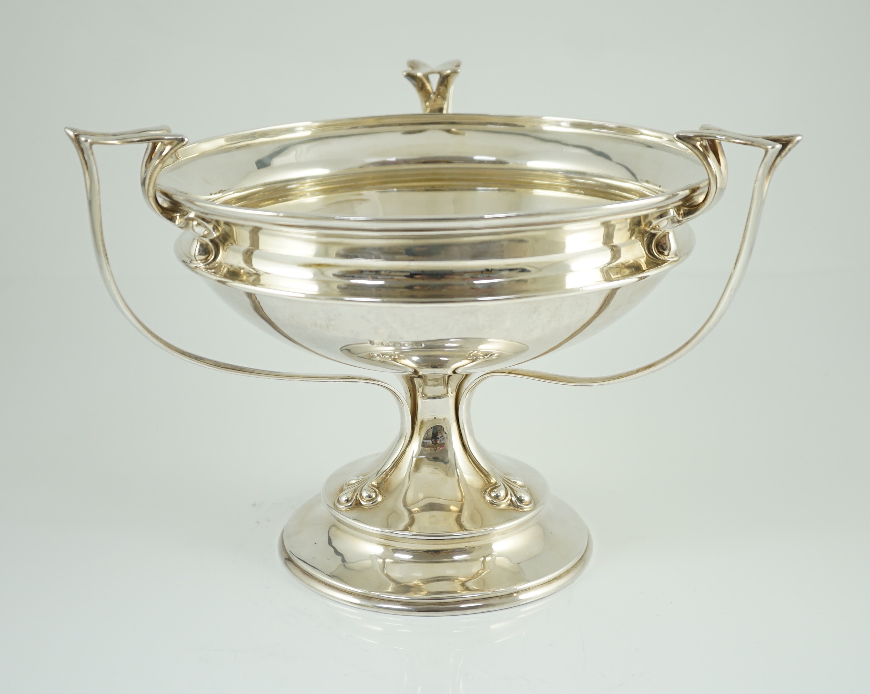 An Edwardian Art Nouveau silver tri-handled pedestal fruit bowl, by Joseph Rodgers & Sons